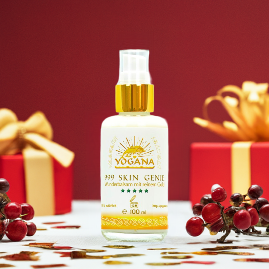 YOGANA 999 Skin Genie Wunderbalsam mit reinem Gold in einer 100 ml Sprühflasche, stilvoll präsentiert mit rotem Hintergrund und festlichen Akzenten.